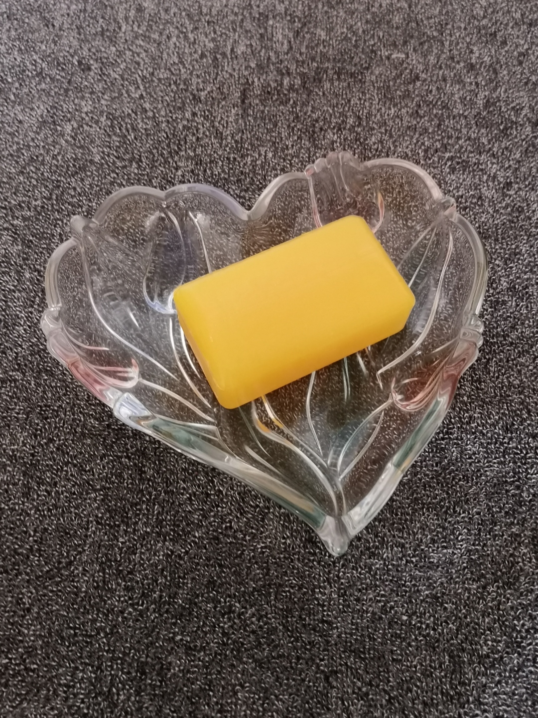 Pure beeswax soap bar in a heart dish